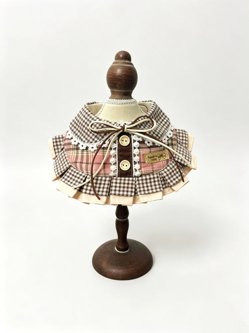 Brown gingham ruffle bib with lace and bow
