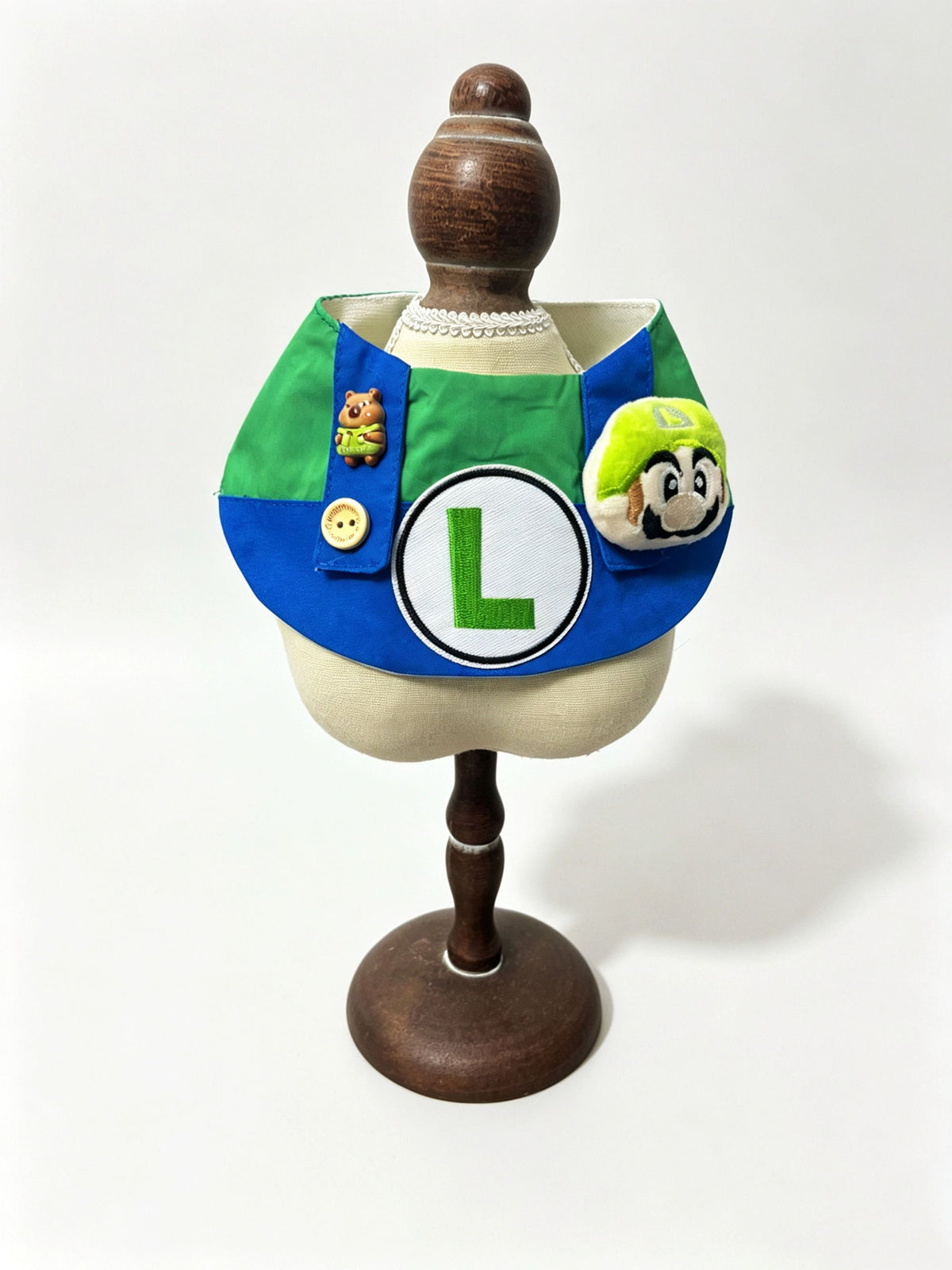 Green and blue overall bib